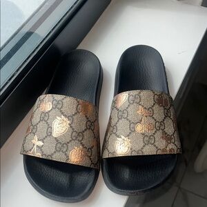 Gucci Black and Gold Patterned Slides